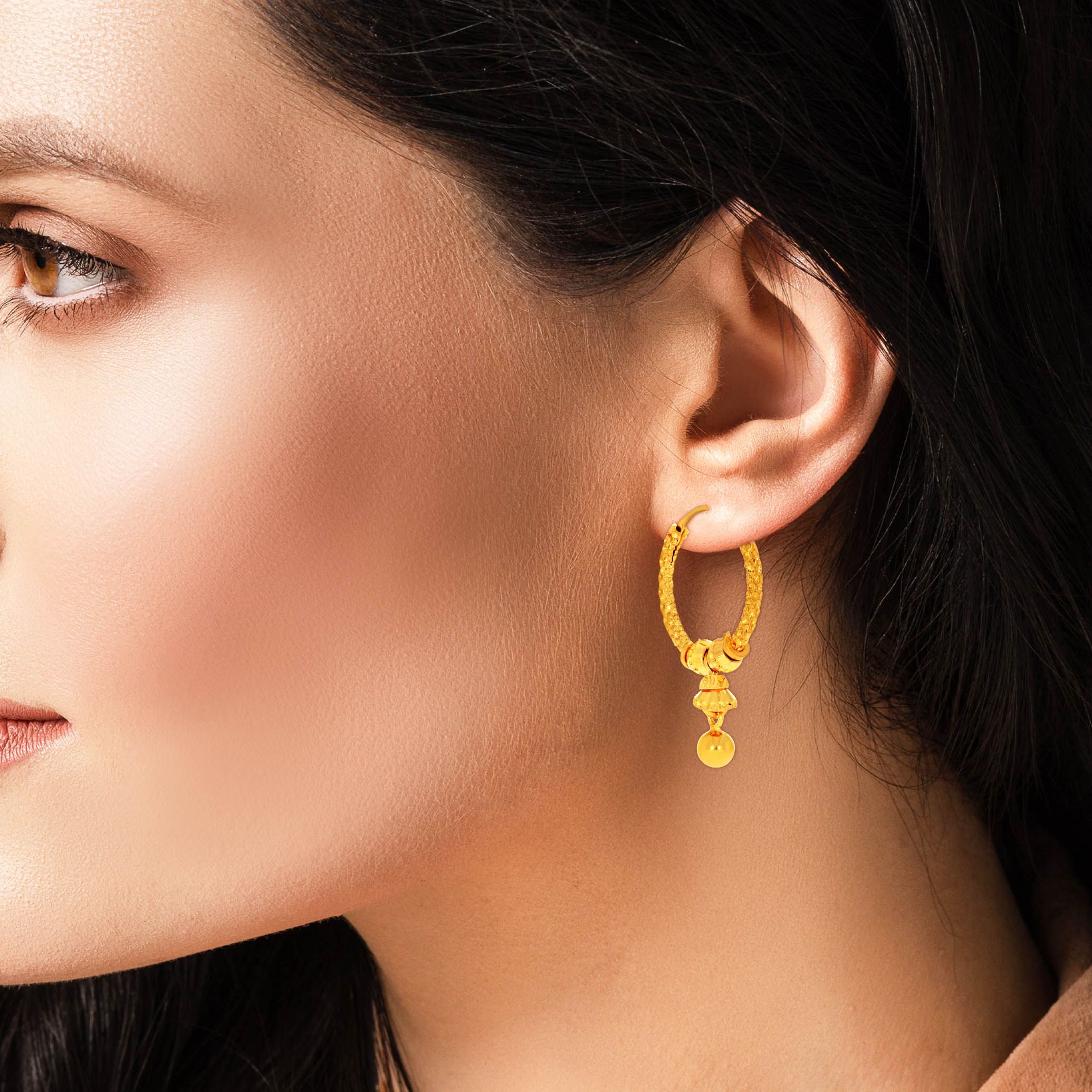 Gleaming Gold Twirl Hoop Earrings for Every Occasion